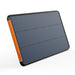 A rectangular Jackery SolarSaga 100 solar panel features a black frame, orange edge, and segmented cells. "Jackery" is printed on the orange side. The panel is angled on a white background, perfect for portable power stations.