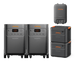 Two large Jackery Explorer 5000 Plus power stations, each with display screens, outlets, and orange accents, are shown alongside two stackable modules and a wall-mounted unit—perfect for backup power or solar generator use.