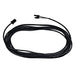 A coiled black electrical cable by Nature's Generator with connectors at each end, designed for their Power Panel and 100W Monocrystalline solar panel kit, is shown on a white background.