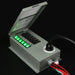 A Nature's Generator metal electrical box with a hinged lid is open, showing six illuminated green switches labeled 1–6. Multiple cables, including a 30 Amp L5-30P Inlet for a generator transfer switch kit, enter from the side and front.