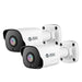 Two white Nature's Generator home security cameras are mounted on white wall brackets, angled left. With black front panels and multi-colored lenses, these 5MP wide-angle cameras feature advanced AI detection.