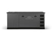 The Briggs & Stratton 48kW commercial standby generator features a dark gray, rectangular design, front panel doors, right-side ventilation grilles, and a centered logo on the front for reliable backup power.