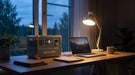 Pecron E500LFP portable power station powering a laptop during a home power outage