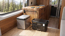 Pecron F1000LFP portable power station powering a fridge in a camper van