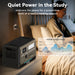 An ALLWEI US PPS2400 solar-compatible portable power station with a LiFePO4 battery sits on a bedside table, plugged in. A graph shows S Mode noise levels under 40dB, ensuring quiet operation for work or reading.