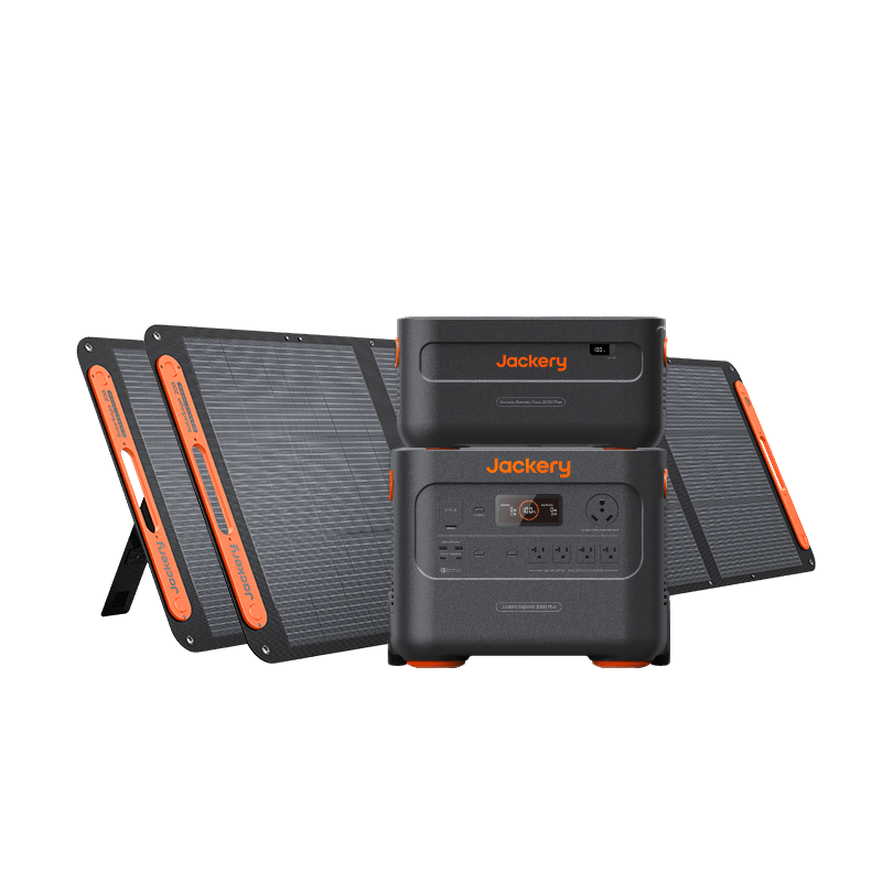 Two black and orange Jackery portable solar generators are placed in front of three foldable solar panels, displayed on a plain white background.