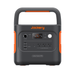 The Jackery Explorer 2000 LiFePO₄ portable generator features a handle, multiple front input/output ports including AC outlets and USB ports, an easy-to-read display screen, and distinctive orange side accents.